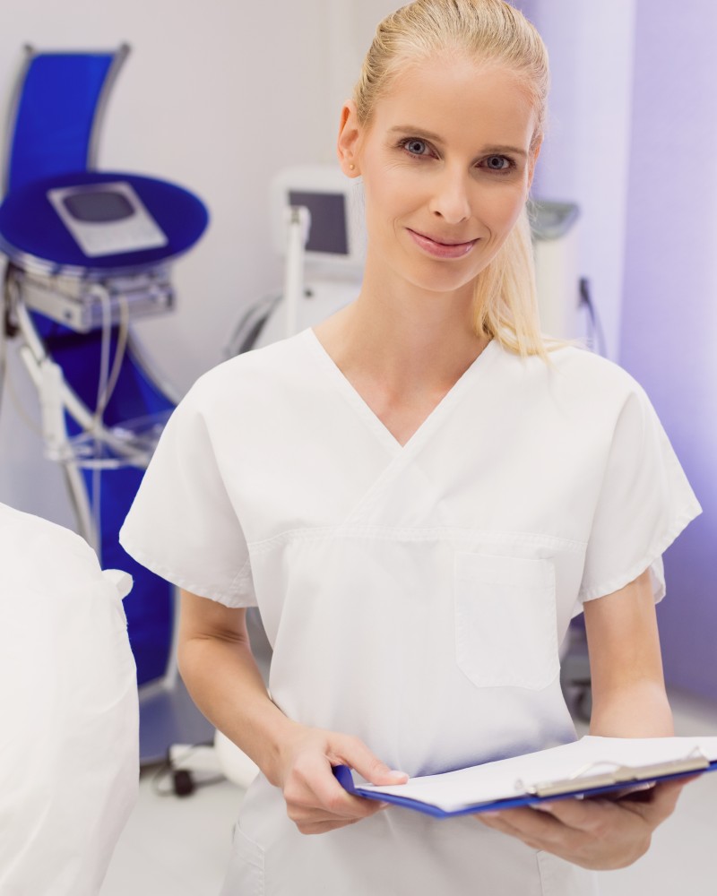 female-doctor-holding-reports-clinic (1)